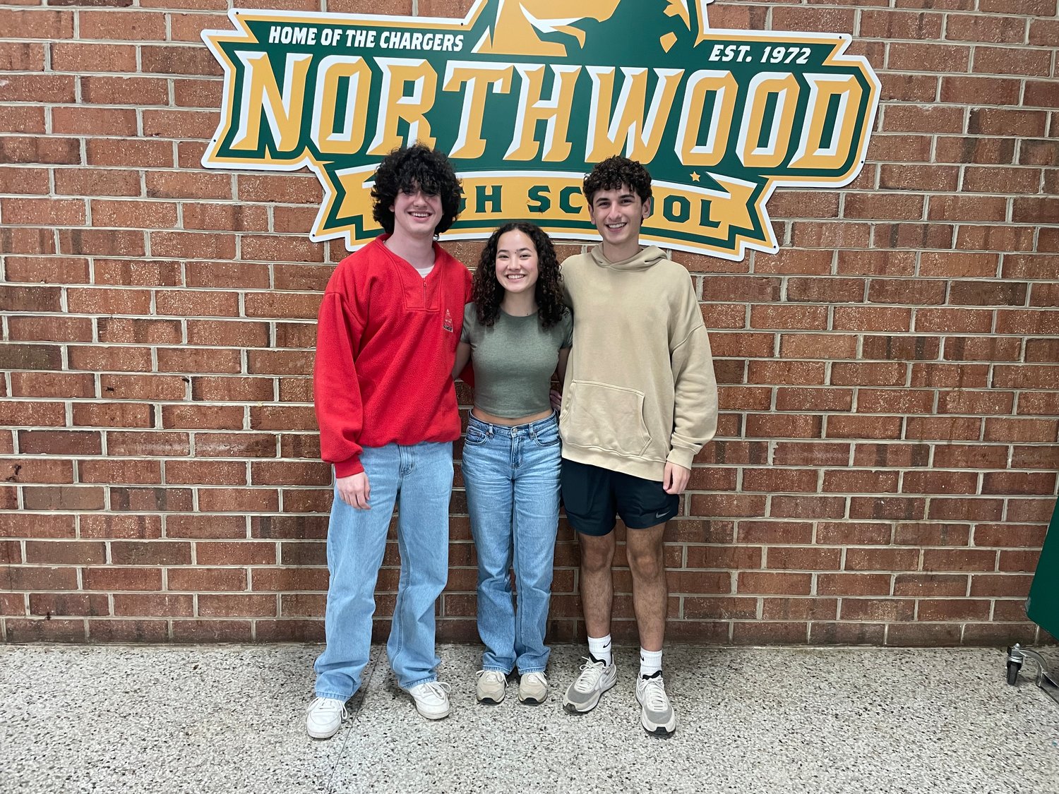 Northwood High School seniors Scott Oglesbee, left, Revy Godehn, center, and Gio Cacciato, right, are leaders of the Chatham Youth Atkins Scholarship. The scholarship hopes to provide at least $2,500 toward college for an underprivileged student in the county.